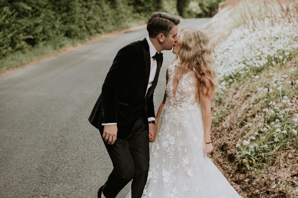 Luxury bridal design at Lough Eske Castle featuring a bride wearing a couture wedding gown during a destination wedding in Ireland.